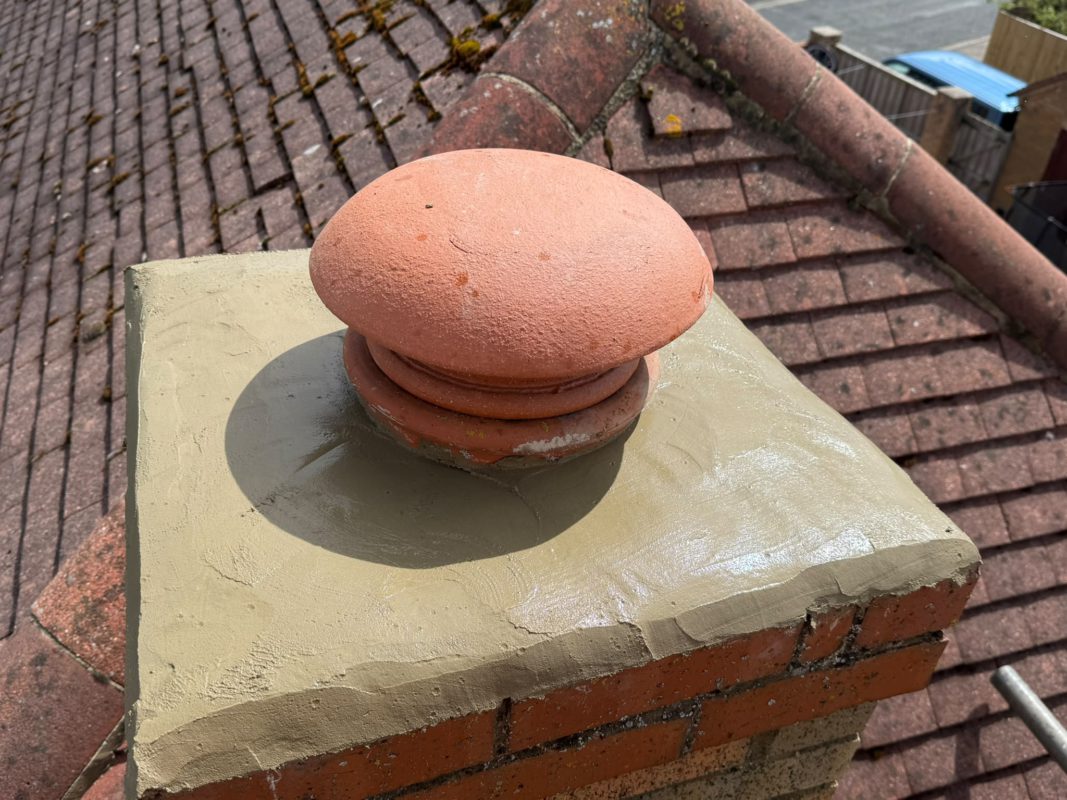 Cracked chimney flaunching repair with new clay chimney cowl fitted in Guisborough by Samuel Moore Roofing
